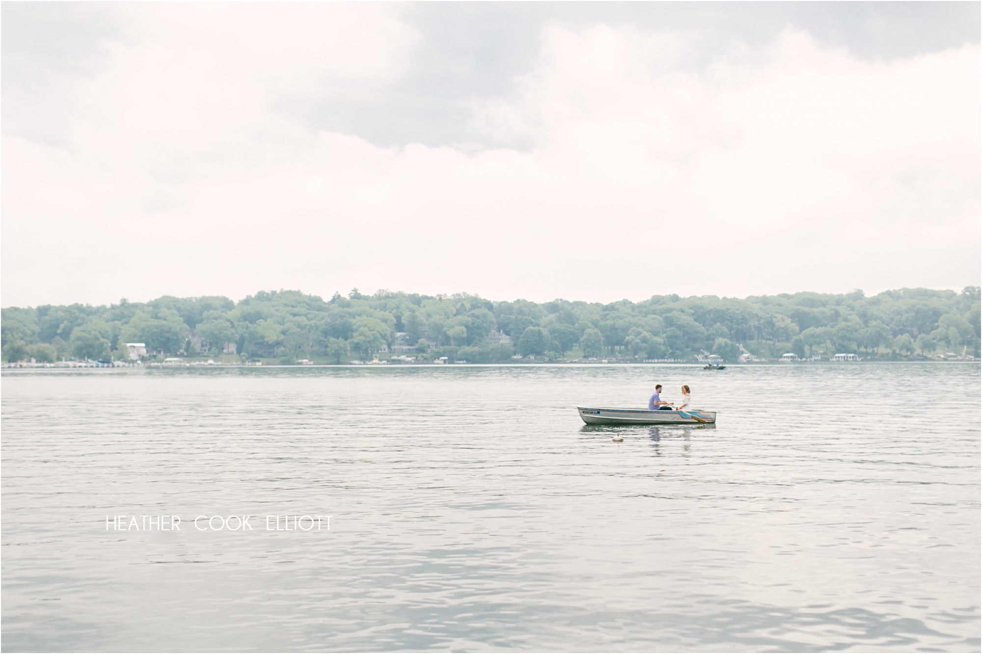 lake geneva wedding rowboat engagement