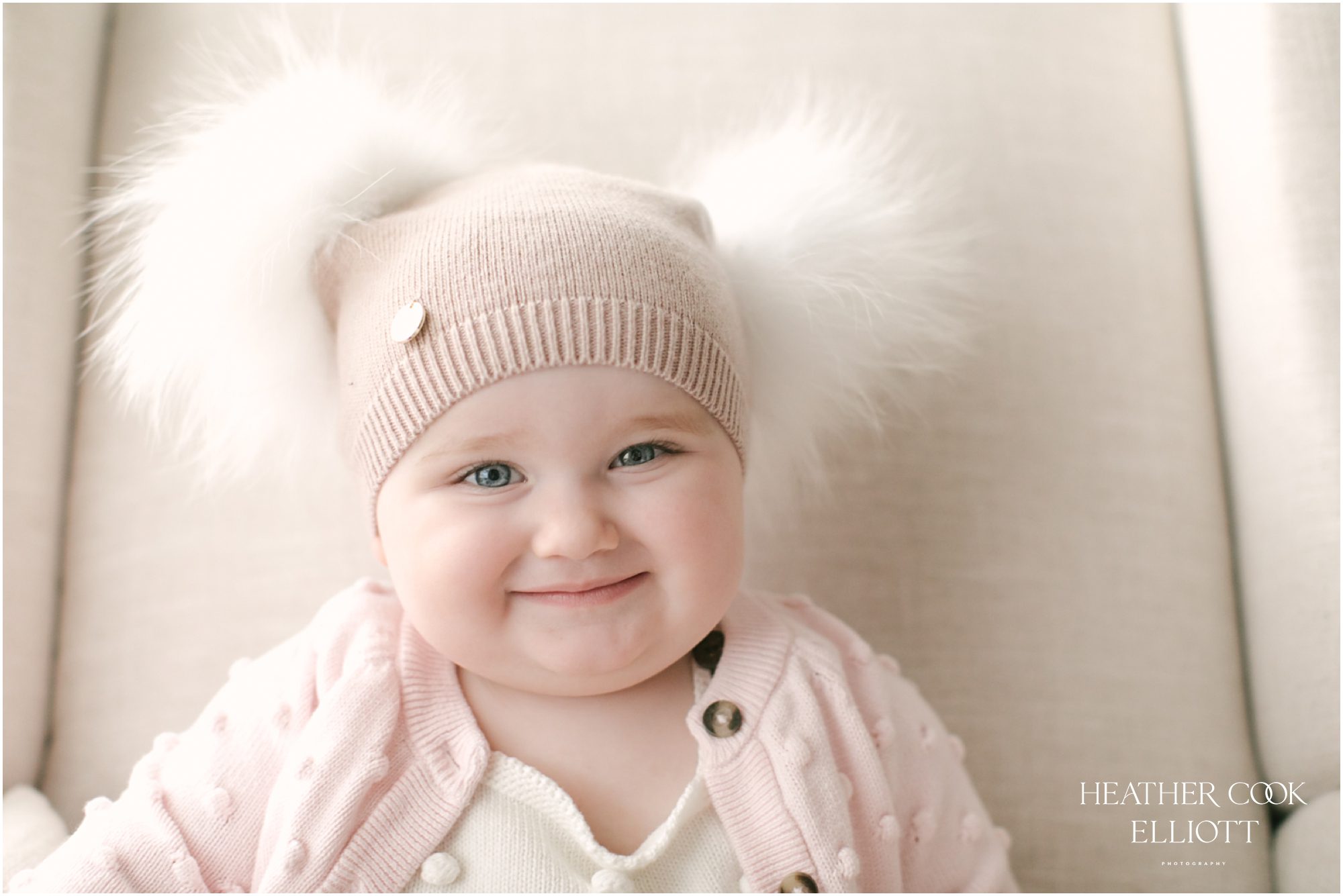 natural light 1 year old at home with puffball hat