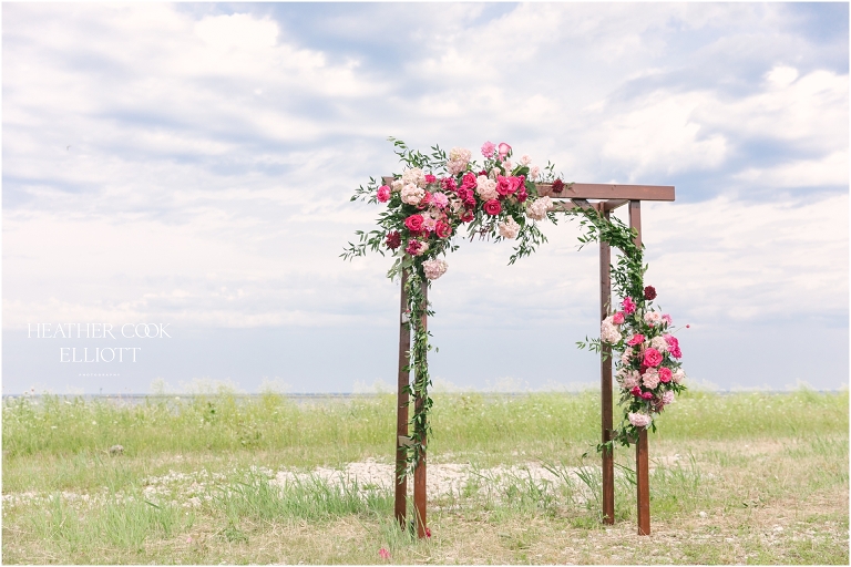 Milwaukee outdoor same sex wedding at port of milwaukee with gorgeous florals