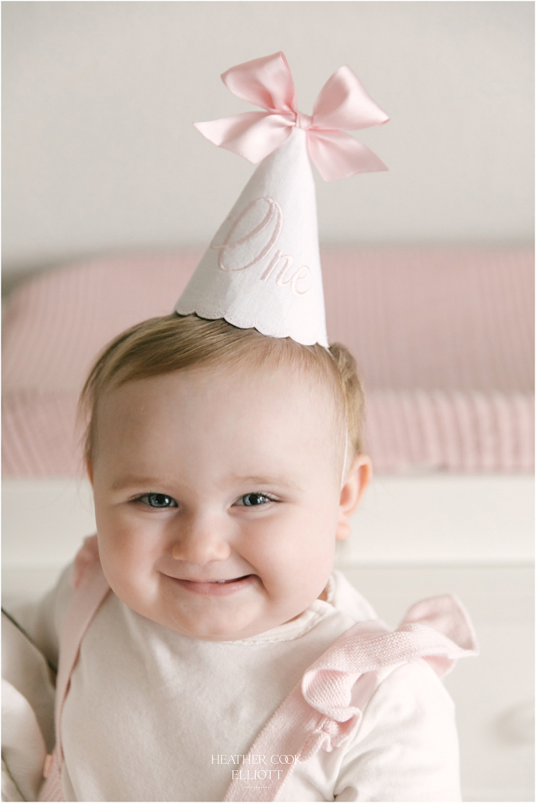 natural light 1 year old at home with pink details