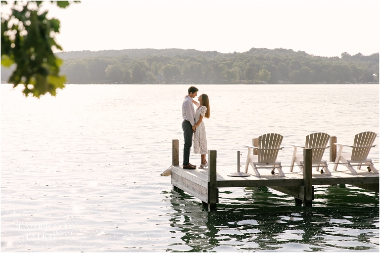 wisconsin lake house engagement session on pier