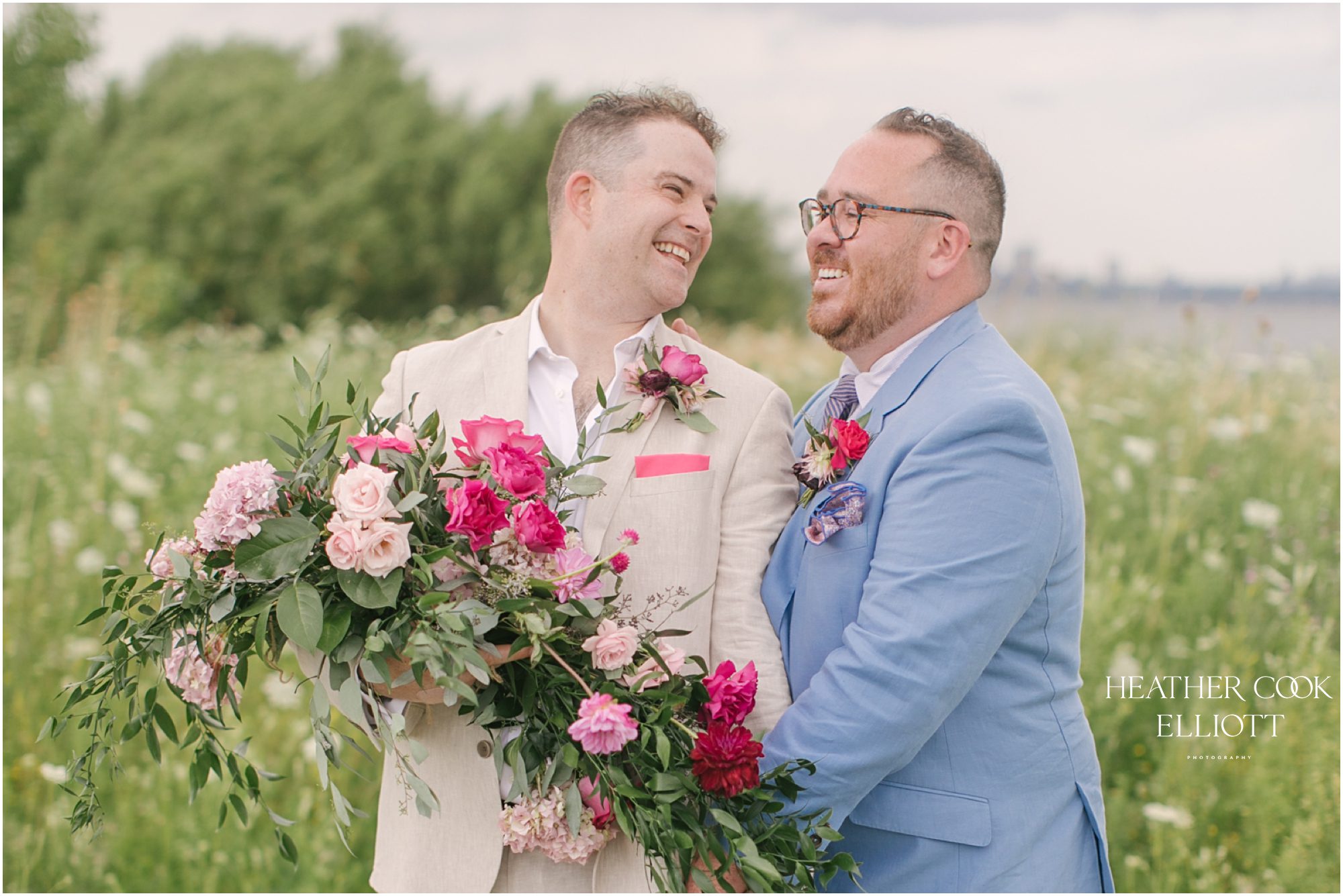 Milwaukee outdoor same sex wedding at port of milwaukee with gorgeous florals