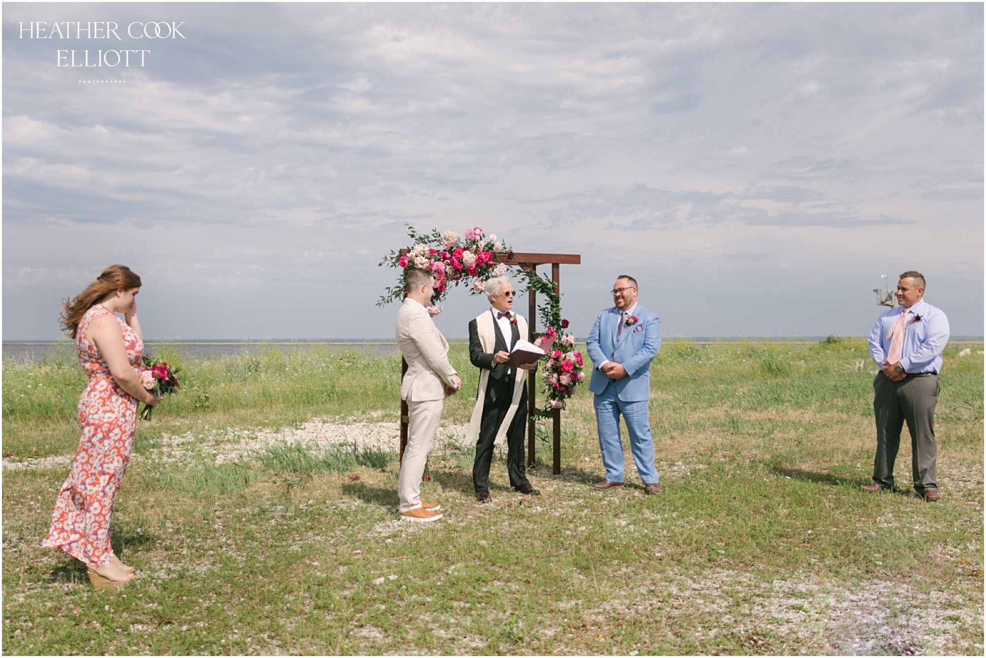 Milwaukee outdoor same sex wedding at port of milwaukee with gorgeous florals