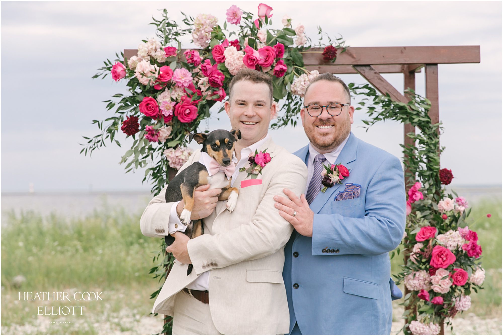Milwaukee outdoor same sex wedding at port of milwaukee with gorgeous florals and rescue dog