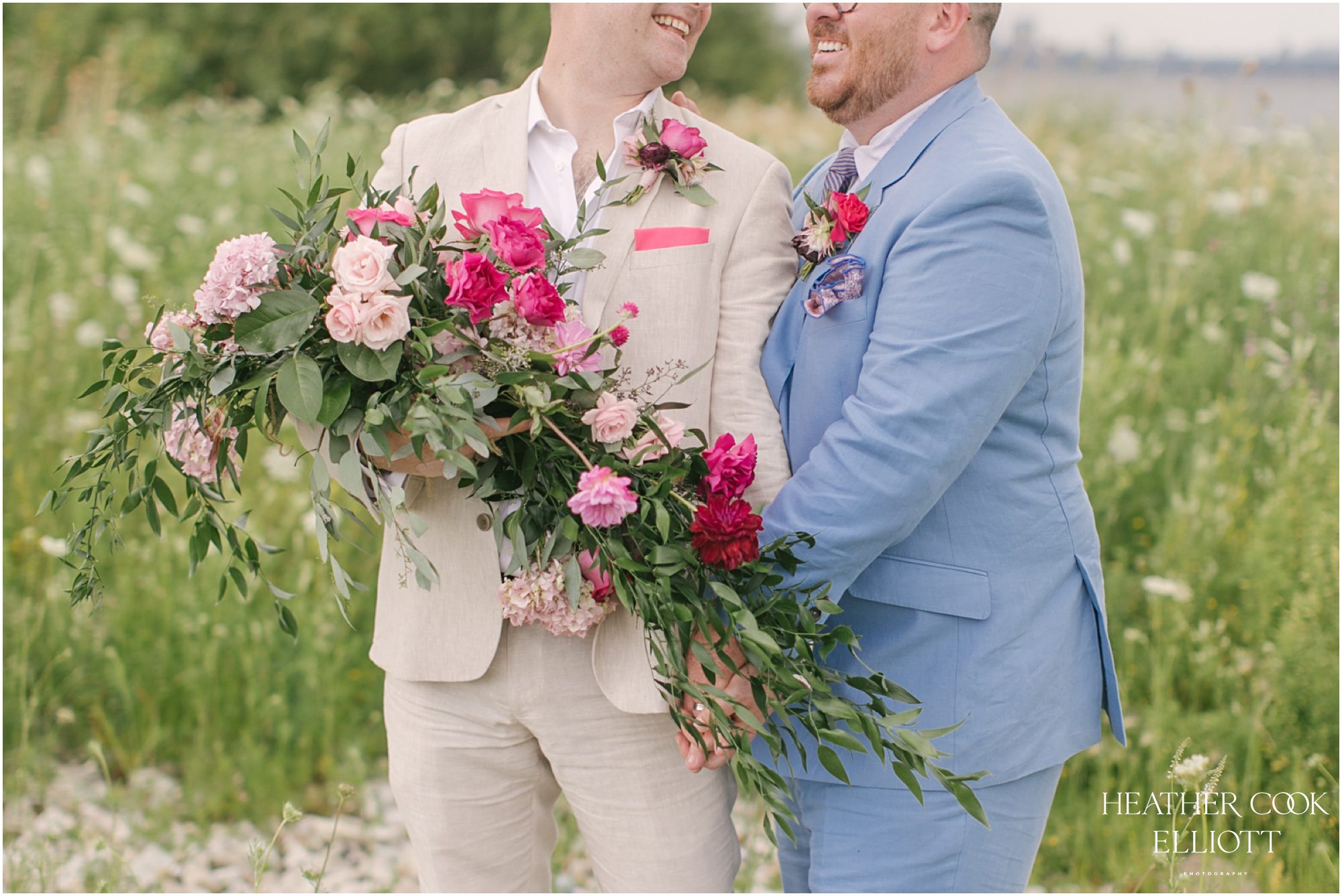 Milwaukee outdoor same sex wedding at port of milwaukee with gorgeous florals and rescue dog