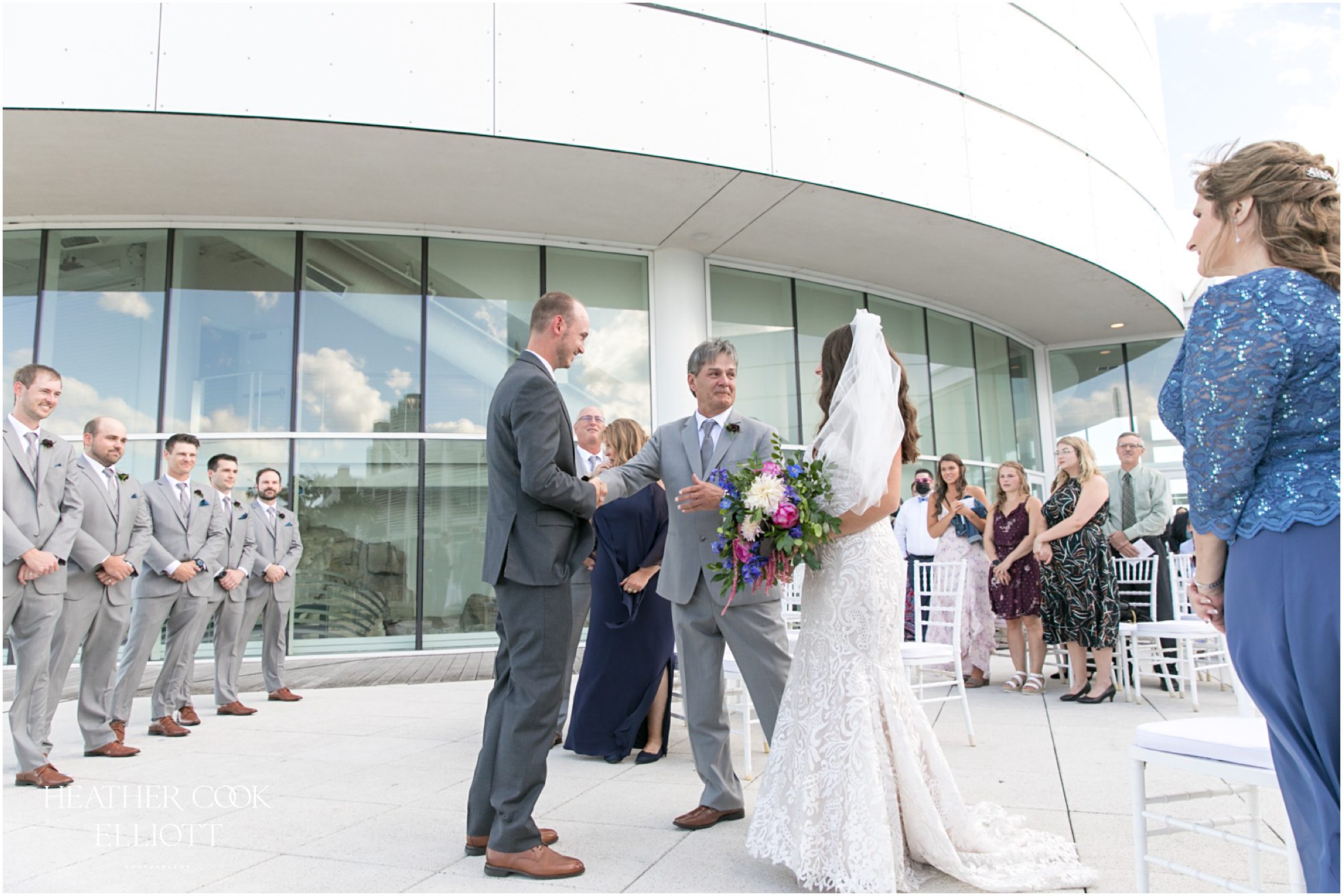 discovery world lakefront wedding ceremony on patio