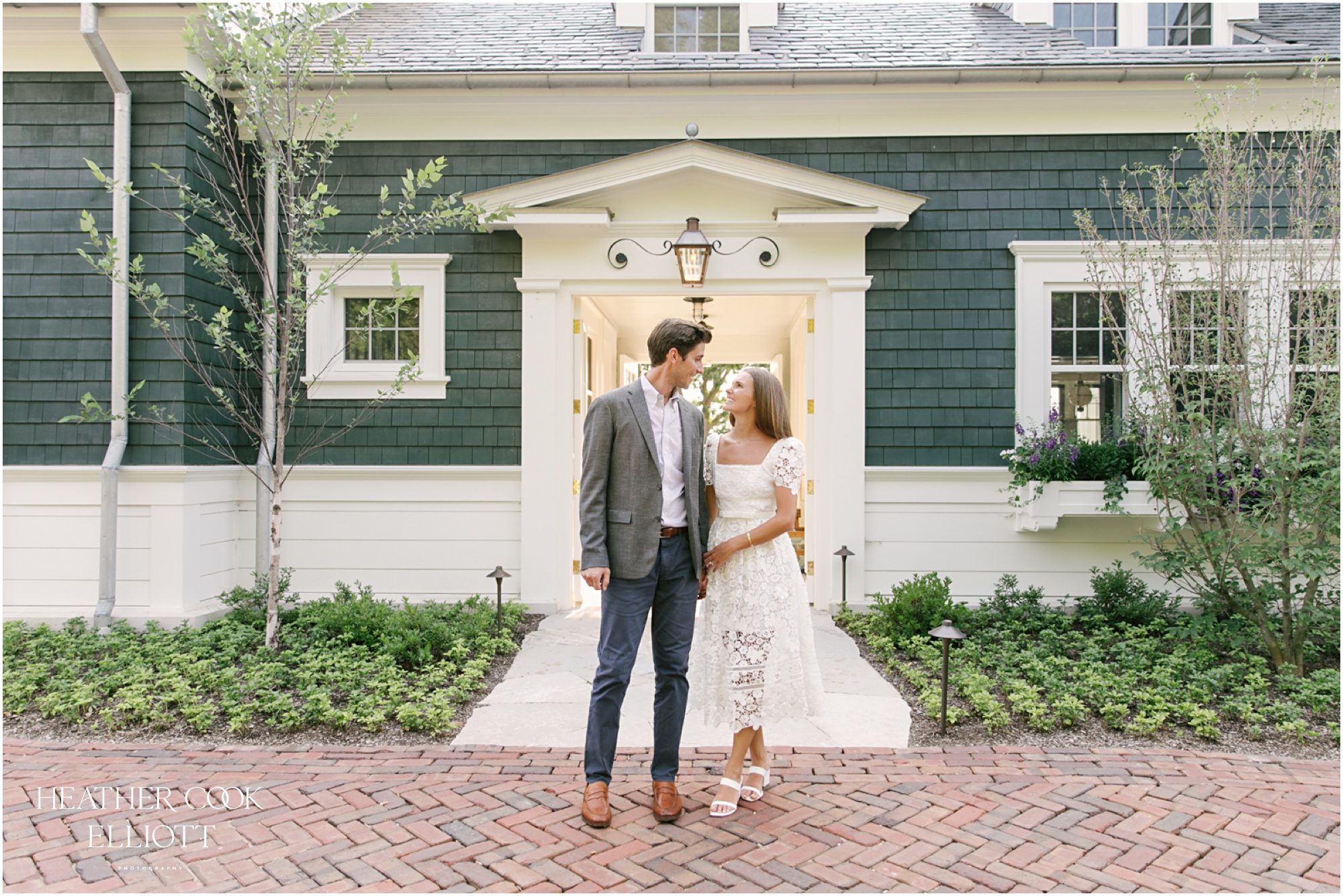 wisconsin lake house engagement session on pier