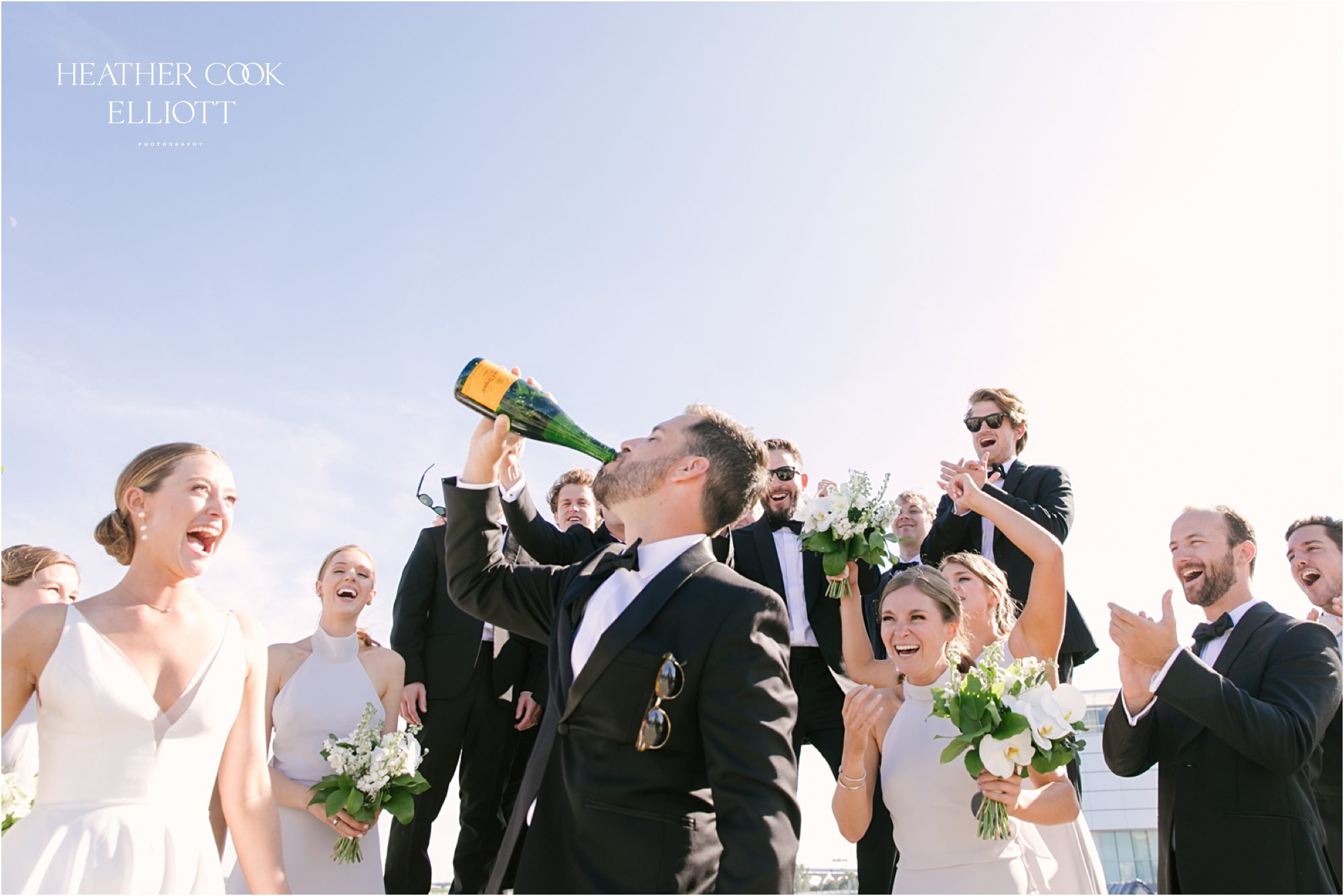 champagne toast at milwaukee lakefront for wedding bridal party